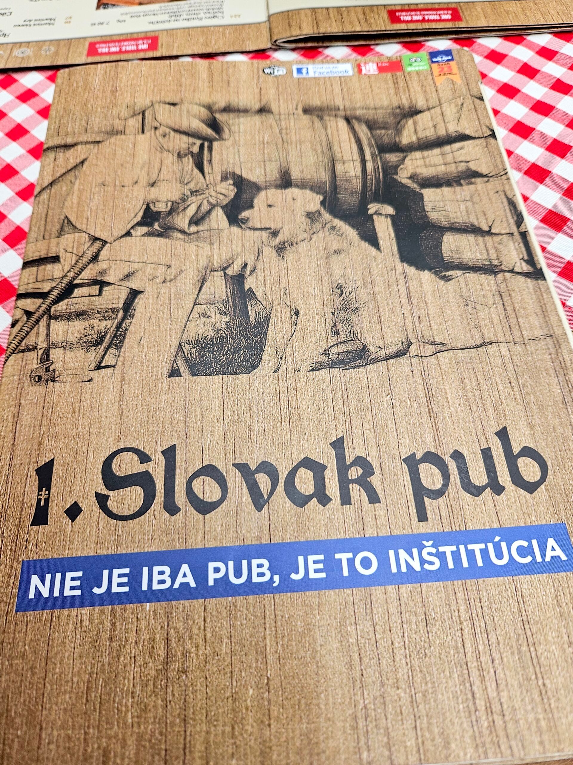 Menu lokalu slovak pub w bratysławie z hasłem nie je iba pub, je to inštitúcia