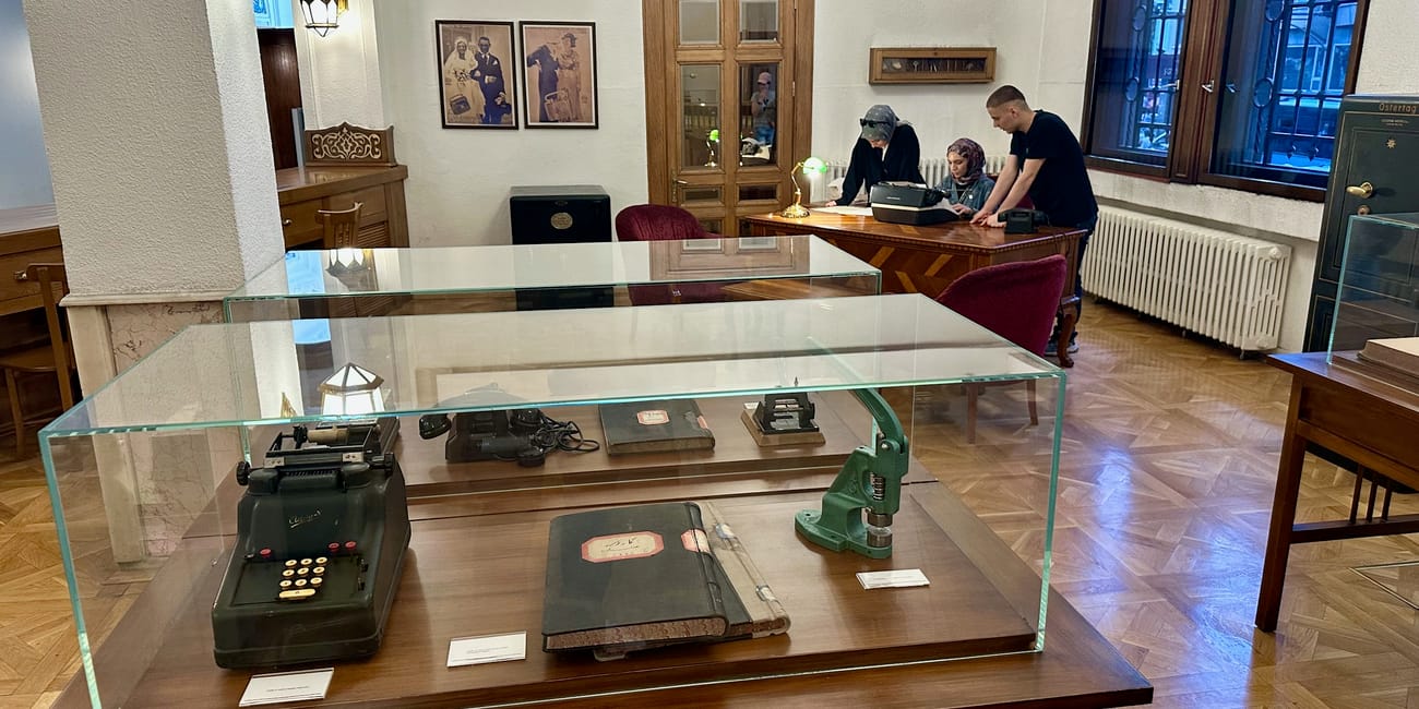 Exhibit room at turkey, ankara economic independence museum, with typewriters and a glass display case in the foreground