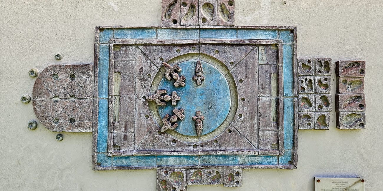 Decorative blue-and-metal plaque at ankara cso ada, turkey, with a round central emblem