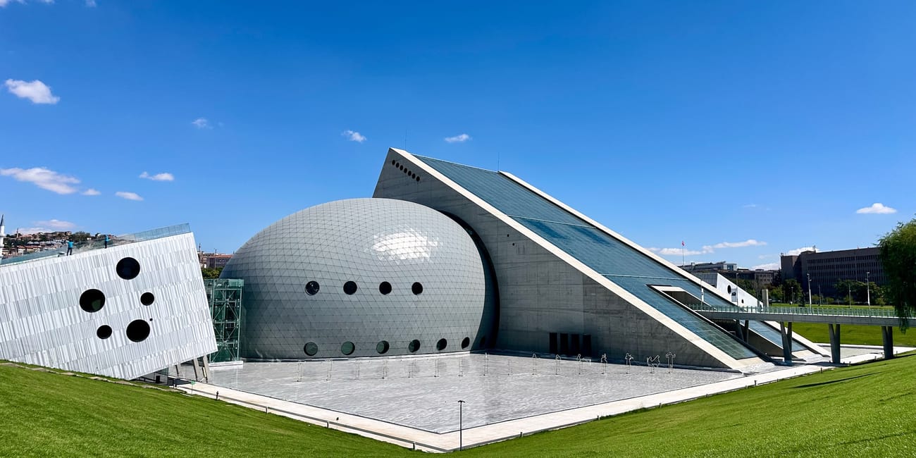 Turkey, ankara cso ada exterior with a large domed concert hall under a blue sky