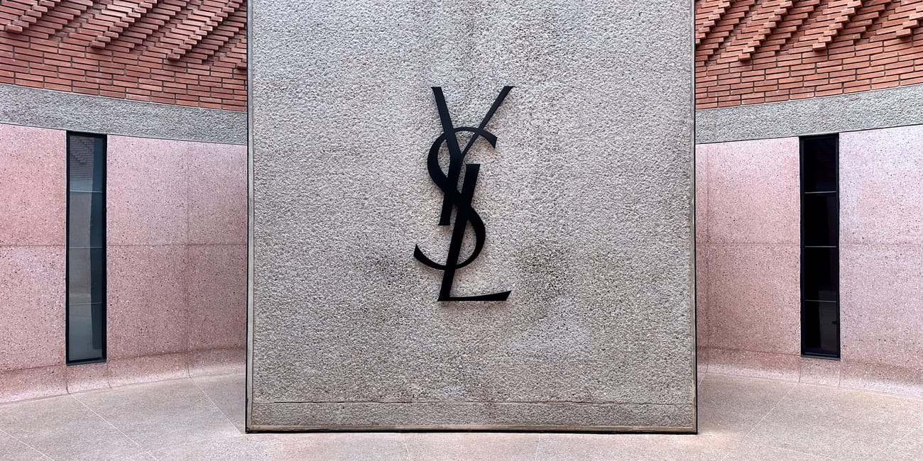 Yves saint laurent museum in marrakesh, morocco, featuring a large wall sign with the ysl logo