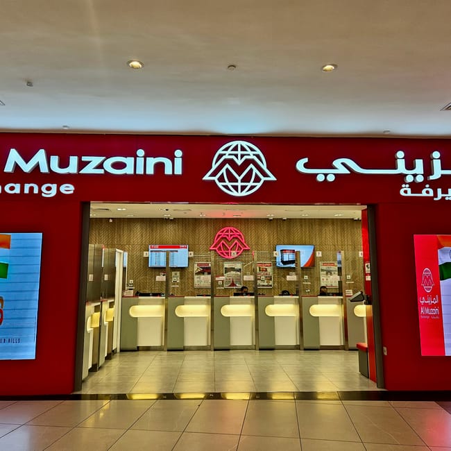 Al muzaini exchange money exchange office in kuwait, with red signage and counters visible inside