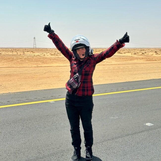 Saudi arabia, al ula jadzia with motorcycle helmet on road